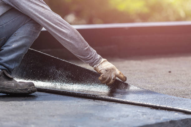 Professional Basement Waterproofing technician working in Lancaster, KY